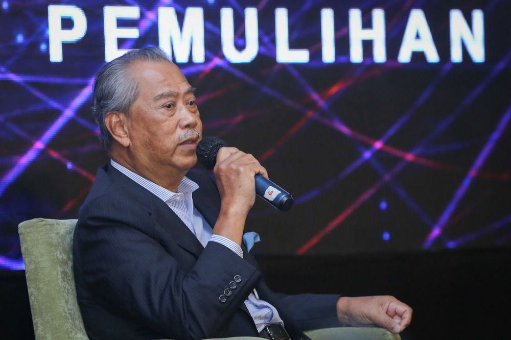 National Recovery Council chairman Tan Sri Muhyiddin Yassin delivers his speech during the NRC Town Hall event at Pullman Hotel in Kuching December 15, 2021. u00e2u20acu201d Picture by Yusof Mat Isa 