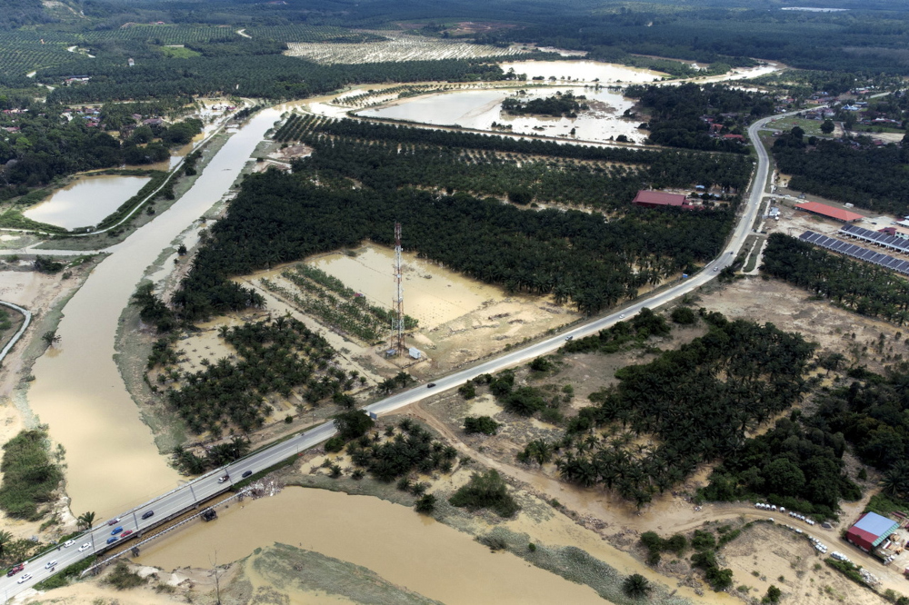 A view of Linggi town in Negri Sembilan inundated with mud and water from the floods on Friday, December 20, 2021. u00e2u20acu201d Bernama pic 