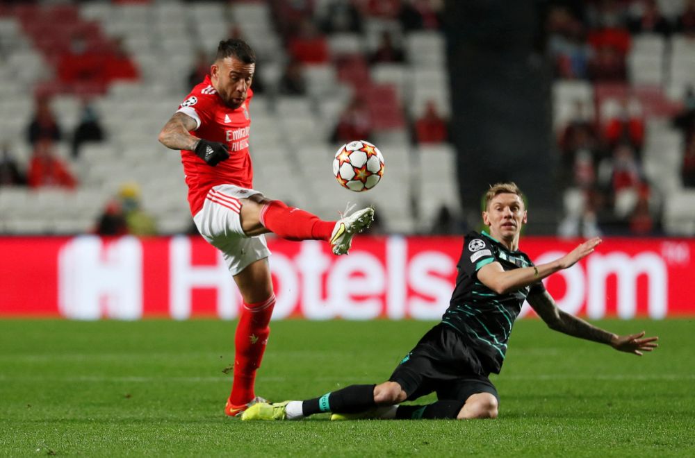 Benfica's Nicolas Otamendi in action with Dynamo Kiev's Denys Garmash at Estadio da Luz, Lisbon, December 8, 2021. u00e2u20acu201d Reuters pic