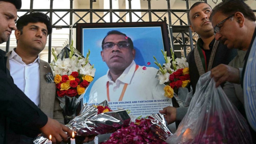 Pakistanis paid tribute to the factory manager. u00e2u20acu201d AFP pic