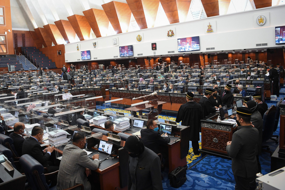 A controlled atmosphere can be seen at the voting session for the Constitution (Amendment) Bill 2021 during the Dewan Rakyat sitting at the Parliament Building, December 14, 2021. u00e2u20acu201d Bernama pic 