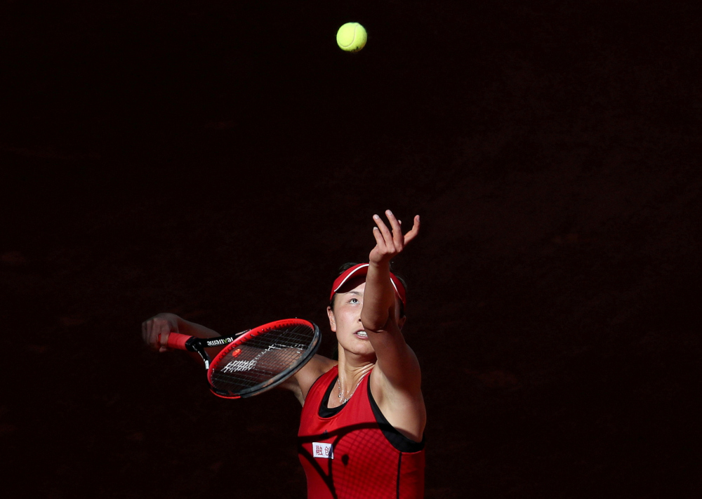 Chinau00e2u20acu2122s Peng Shuai in action against Spainu00e2u20acu2122s Garbine Muguruza during their round of 64 match at the Madrid Open in Spain, May 6, 2018. u00e2u20acu201d Reuters pic 