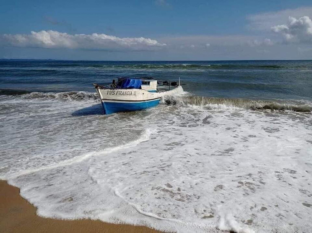 The wreck of the boat u00e2u20acu02dcFranciau00e2u20acu2122, that sank off the coast, is pulled to the beach in north-eastern Madagascar, December 22, 2021 in this picture obtained from social media. u00e2u20acu201d Madagascar Ministry of National Defence pic via Reuters 