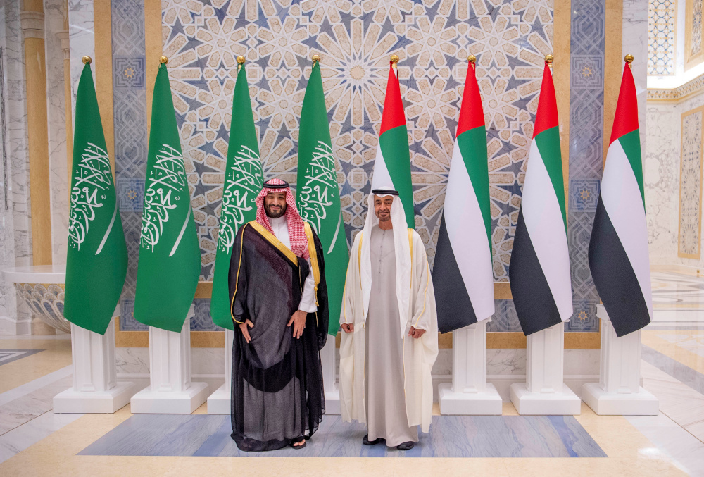 Abu Dhabi Crown Prince Sheikh Mohammed bin Zayed al-Nahyan and Saudi Crown Prince Mohammed bin Salman pose for a photo in Abu Dhabi December 7, 2021. u00e2u20acu201d Bandar Algaloud/Courtesy of Saudi Royal Court/Handout pic via Reuters 