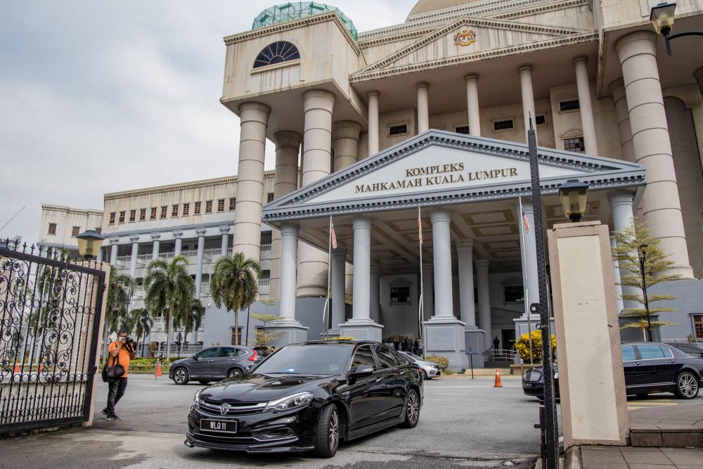 A vehicle ferrying Datin Seri Rosmah Mansor is pictured leaving the Kuala Lumpur High Court December 10, 2021. u00e2u20acu2022 Picture by Firdaus Latiff