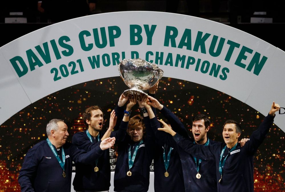 The Russian Tennis Federation team celebrates with trophy on the podium winning the Davis Cup at the Madrid Arena December 5, 2021. u00e2u20acu201d Reuters pic