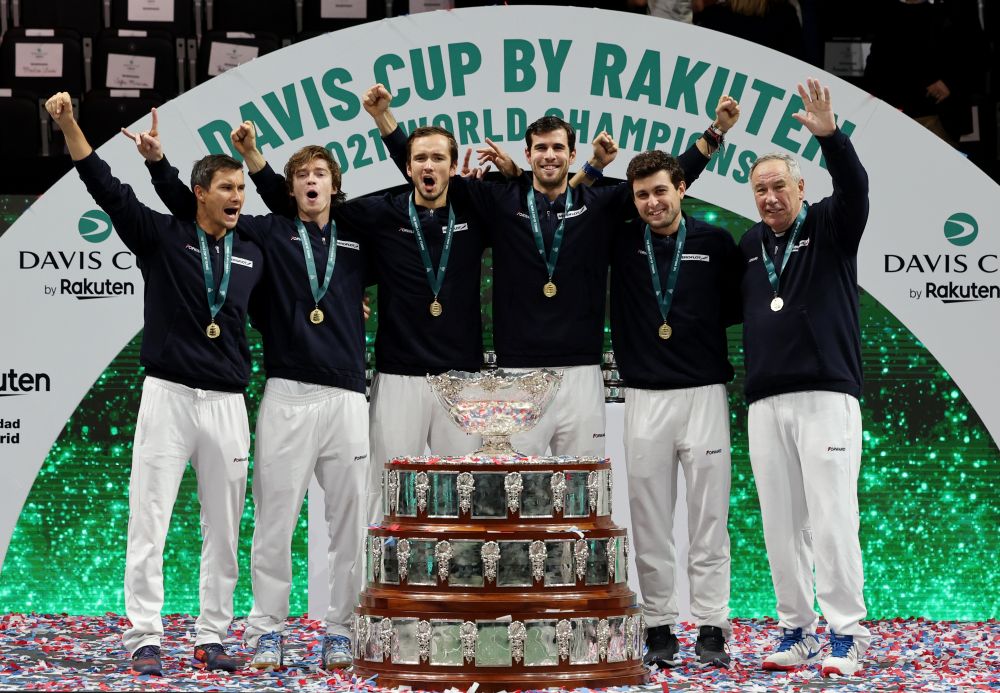 The Russian Tennis Federation team celebrates with trophy on the podium winning the Davis Cup at the Madrid Arena December 5, 2021. u00e2u20acu201d Reuters pic
