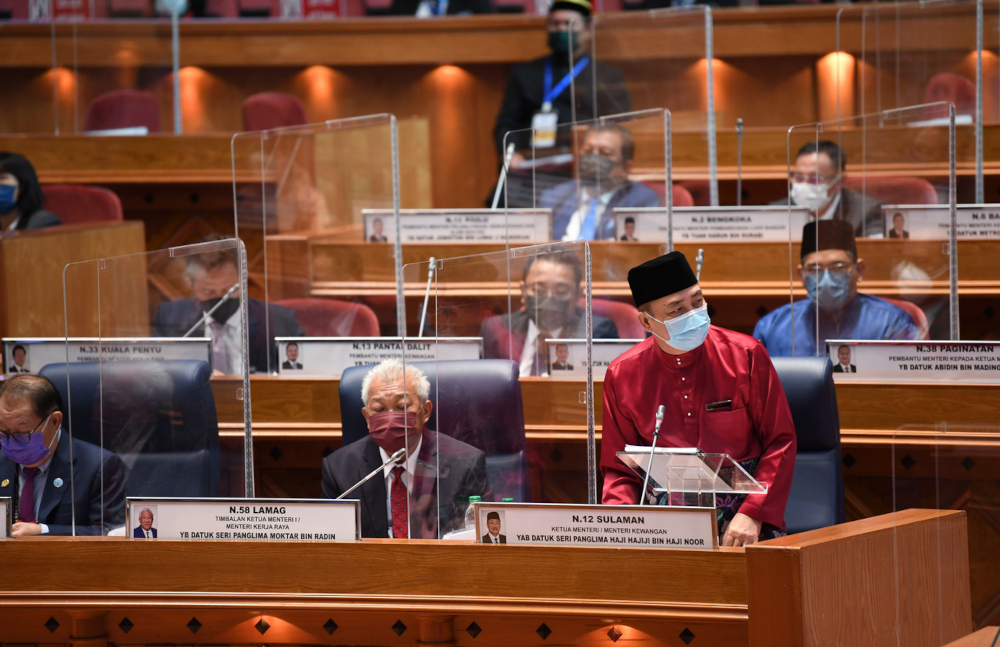 Chief Minister Datuk Seri Hajiji Noor tables the Sabah state Budget 2022 at the Sabah State Legislative Assembly in Kota Kinabalu, December 3, 2021. u00e2u20acu201d Bernama pic