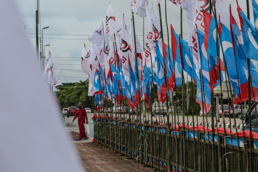 Party flags are pictured ahead of the 12th Sarawak state election in Kuching December 10, 2021. — Picture by Yusof Mat Isa