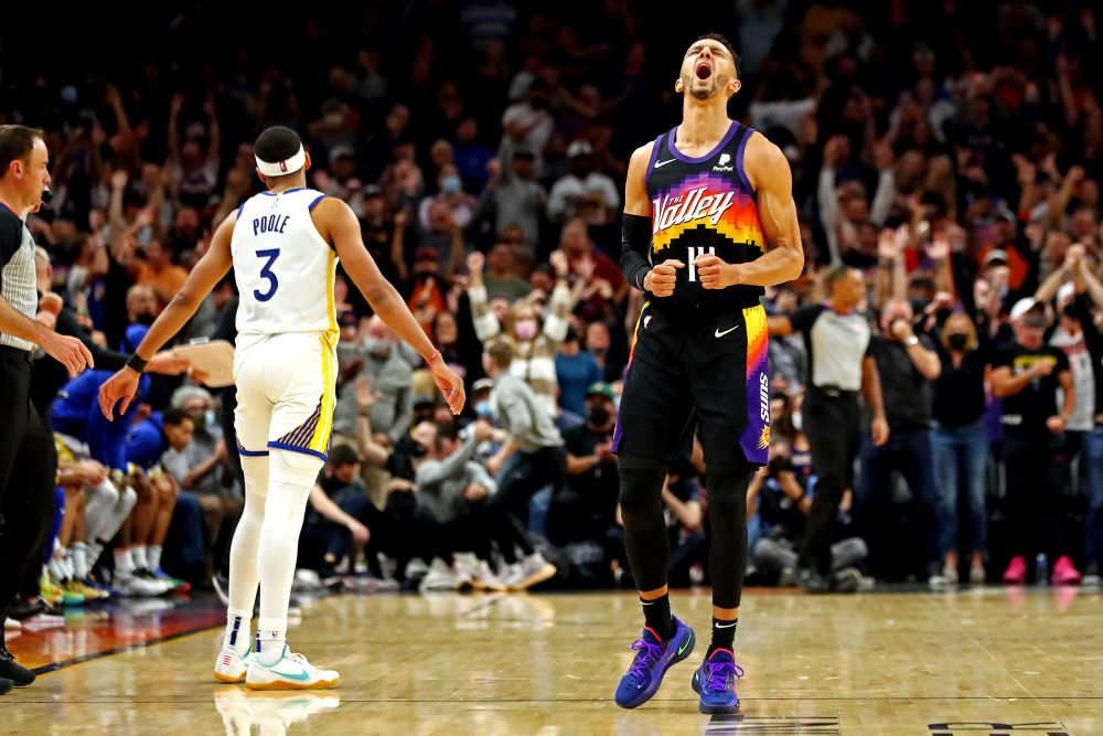 Phoenix Suns guard Landry Shamet (14) reacts during the fourth quarter against the Golden State Warriors at Footprint Centre, Arizona November 30, 2021. u00e2u20acu201d Reuters picnn