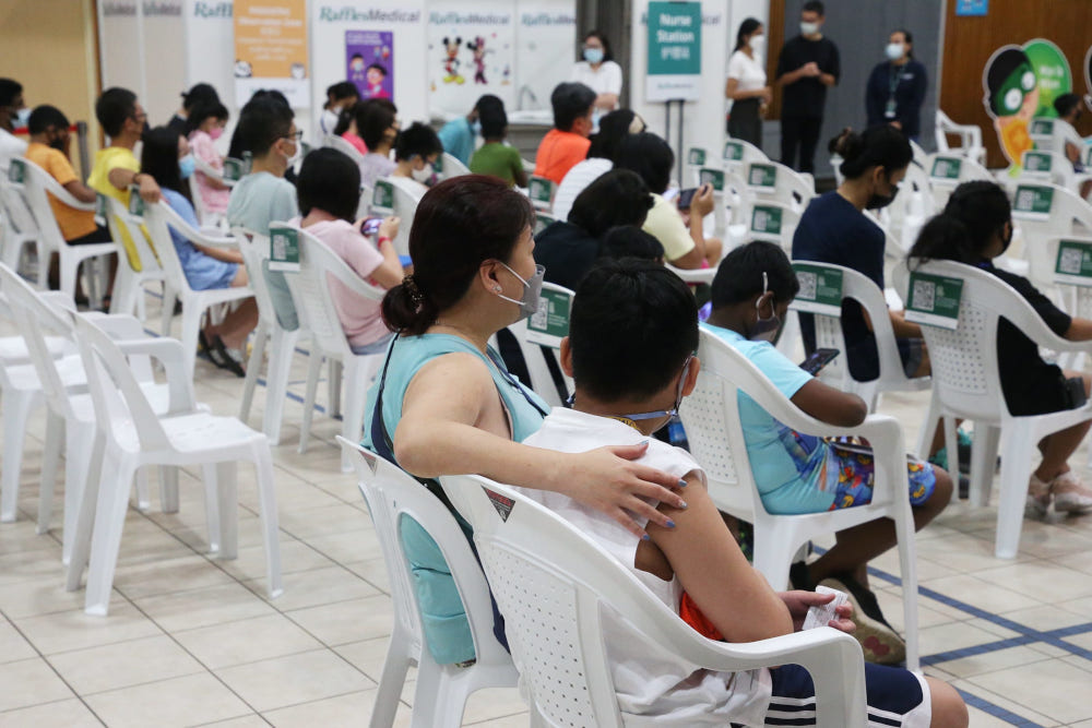 Children being observed after receiving their Pfizer-BioNTech Covid-19 vaccine jab at the Pasir Ris Elias Community Club on Dec 27, 2021. u00e2u20acu201d TODAY picnn