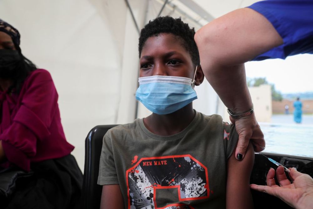 A healthcare worker administers the Pfizer coronavirus disease (Covid-19) vaccine to Simphiwe, 13, amidst the spread of the SARS-CoV-2 variant Omicron in Johannesburg, South Africa, December 04, 2021. u00e2u20acu201d Reuters pic