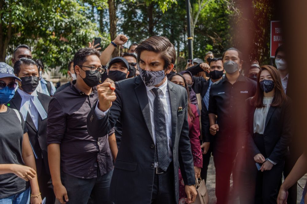 Muda president Syed Saddiq Syed Abdul Rahman addresses supporters at the Kuala Lumpur High Court December 14, 2021. u00e2u20acu201d Picture by Shafwan Zaidon