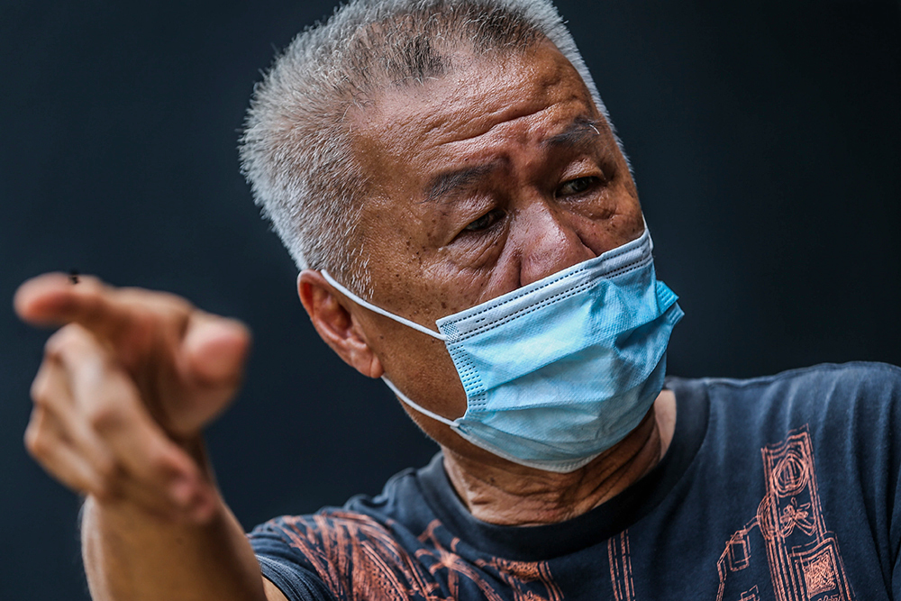 Tee Kim Yeow, 62, speaks to Malay Mail in Taman Sri Muda in Shah Alam, Selangor December 21, 2021.