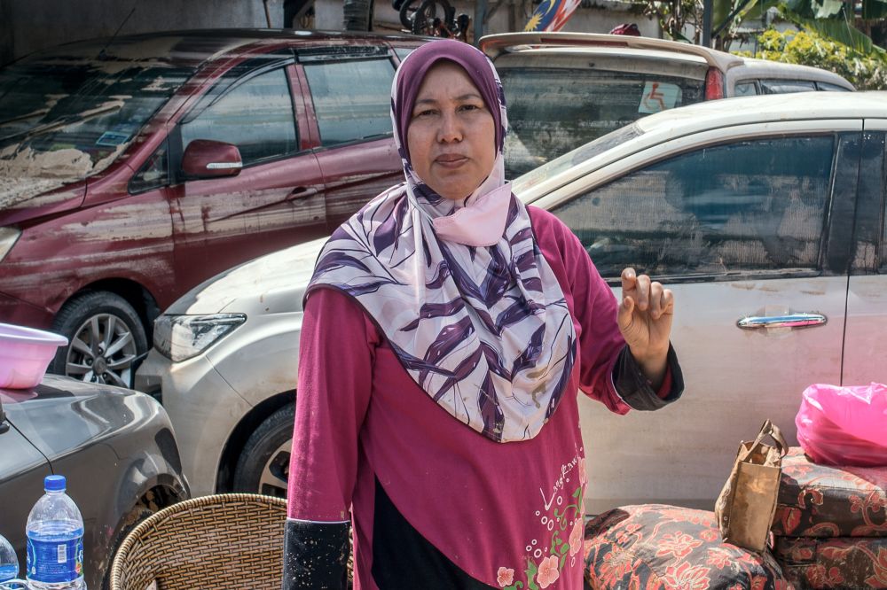Kindergarten teacher Siti Fatimah Janta speaks during an interview with Malay Mail at Taman Sri Nanding, Hulu Langat December 21, 2021. — Picture by Shafwan Zaidon