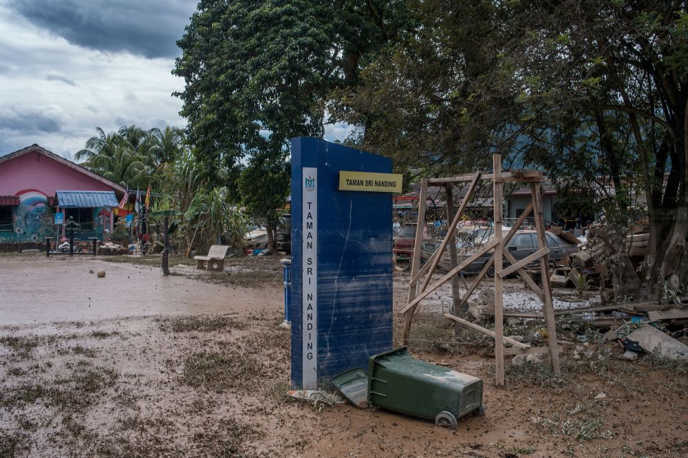 Floods in Taman Sri Nanding, Hulu Langat left the area covered in mud December 21, 2021. u00e2u20acu2022 Picture by Shafwan Zaidon