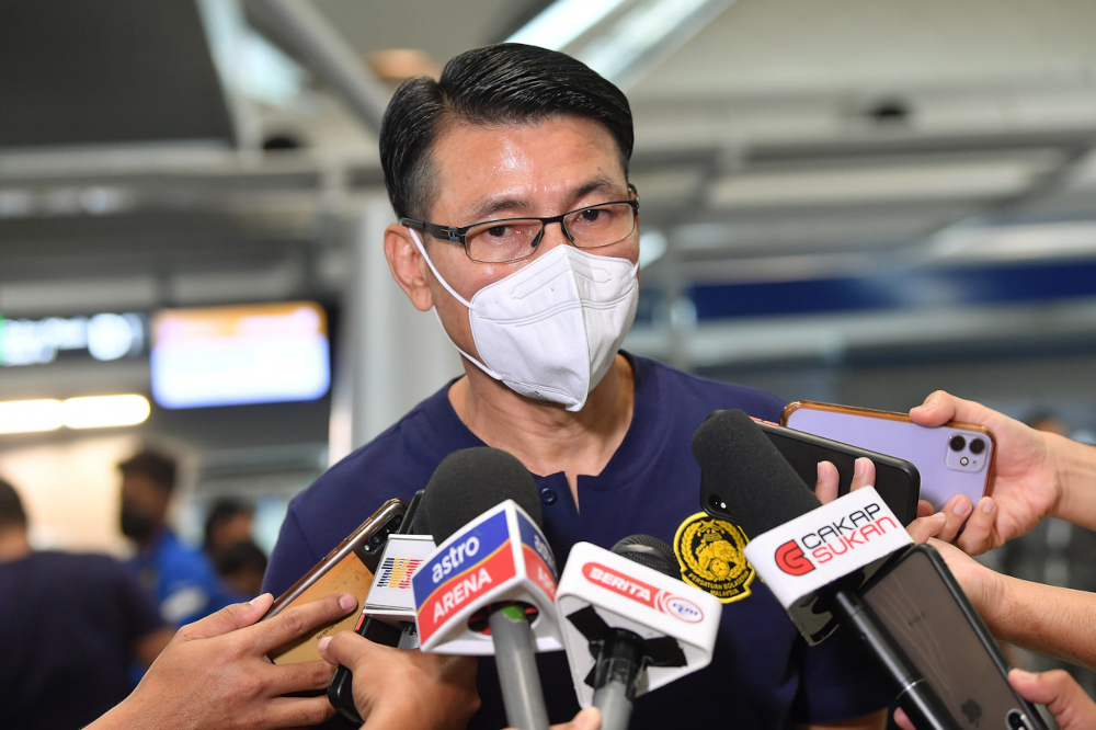 National squad head coach Tan Cheng Hoe speaks to reporters at Kuala Lumpur International Airport before leaving for Singapore with the Harimau Malaya squad, December 3, 2021. u00e2u20acu201d Bernama pic    