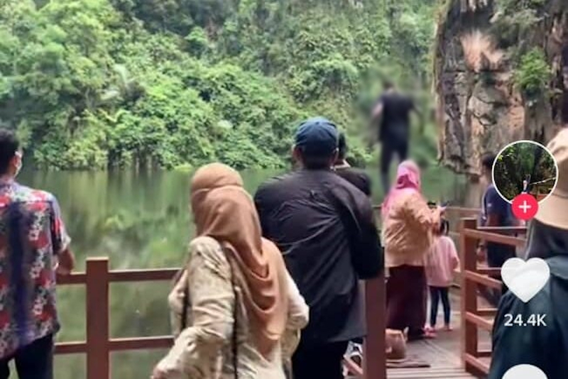 Tasik Cermin (Mirror Lake) is closed starting December 13, 2021 after a video of a man diving into the lake went viral. u00e2u20acu201d Picture via Twitter/Bernama