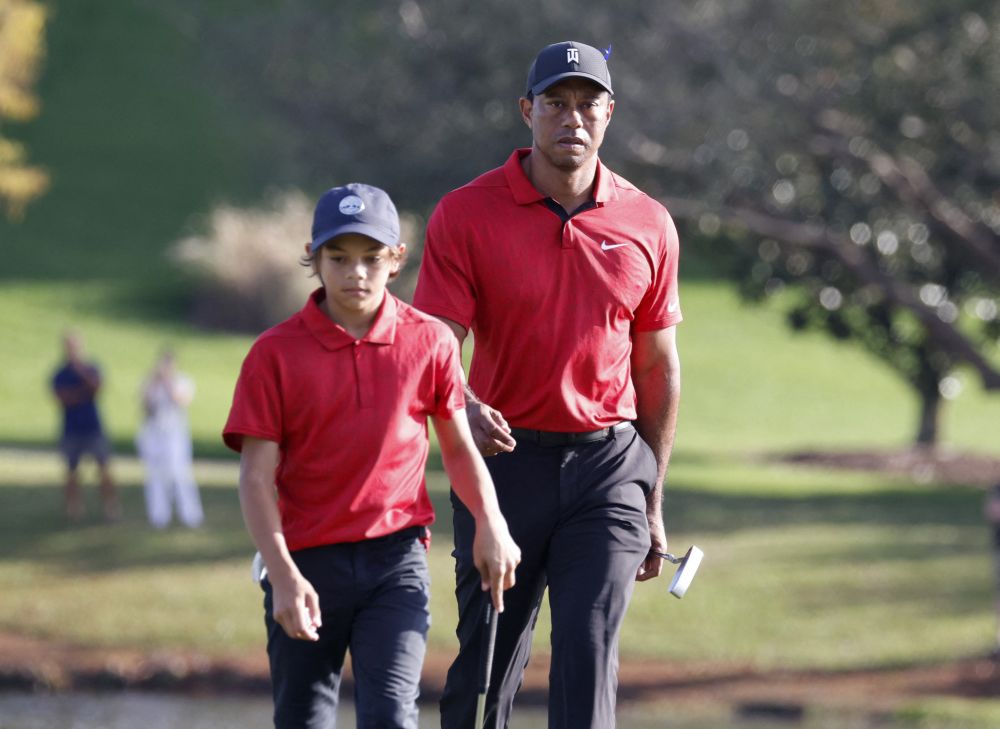 Tiger Woods of the US and his son Charlie on the 17th hole during the second round of the PNC Championship in Orlando December 19 2021. u00e2u20acu201d Reuters pic