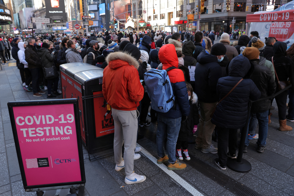People queue for a Covid-19 test in Times Square as the Omicron coronavirus variant continues to spread in Manhattan, New York City, US, December 26, 2021. u00e2u20acu201d Reuters picnn