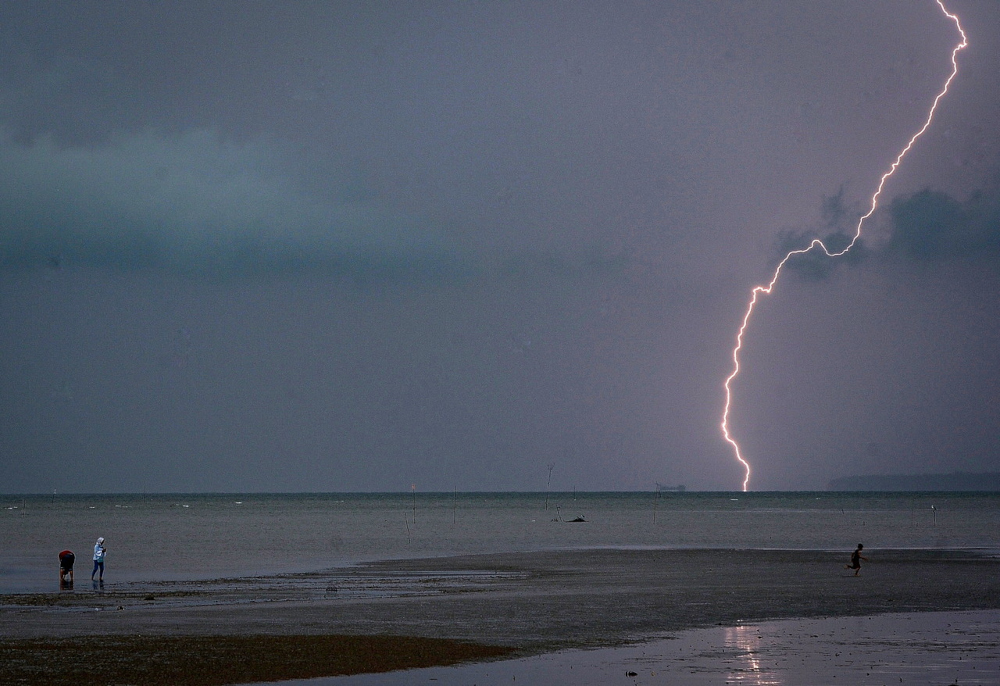 A bolt of lightning is seen at Morib beach in Banting, December 30, 2021. u00e2u20acu201d Bernama pic