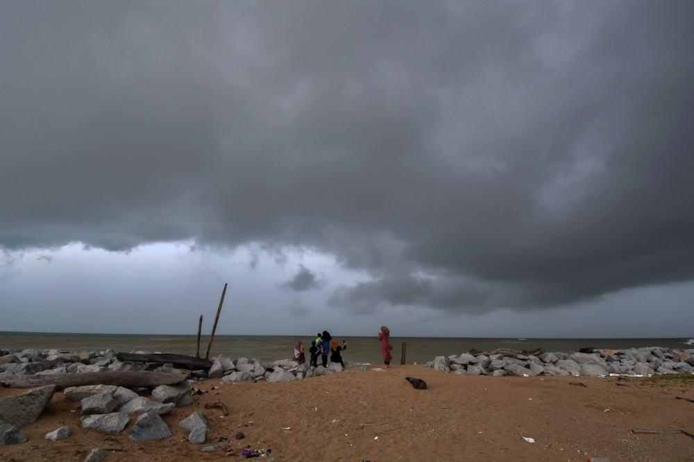 Dark storm clouds gather over Pantai Sabak in Kelantan, December 13, 2021. u00e2u20acu201d Bernama pic