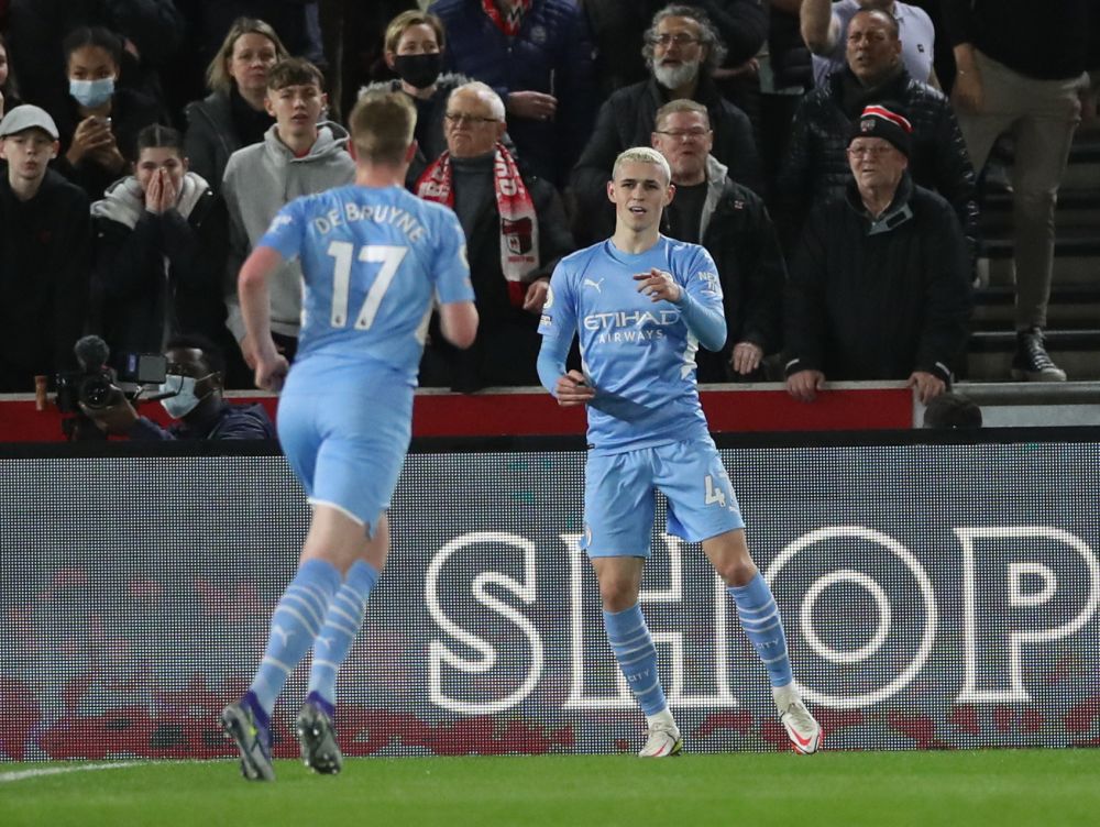 Manchester City's Phil Foden celebrates scoring their first goal against Brentford at the Brentford Community Stadium, London December 29, 2021. u00e2u20acu201d Reuters pic