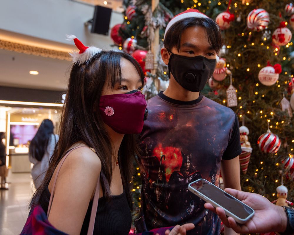 Students Ong Kai Li (left) and Ong Zhi Wen speak to Malay Mail at the Mid Valley Megamall in Kuala Lumpur December 23, 2021. — Picture by Shafwan Zaidon