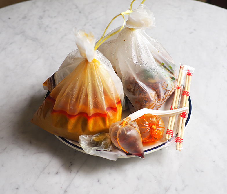 Your takeaway comes complete with disposable chopsticks and spoons.