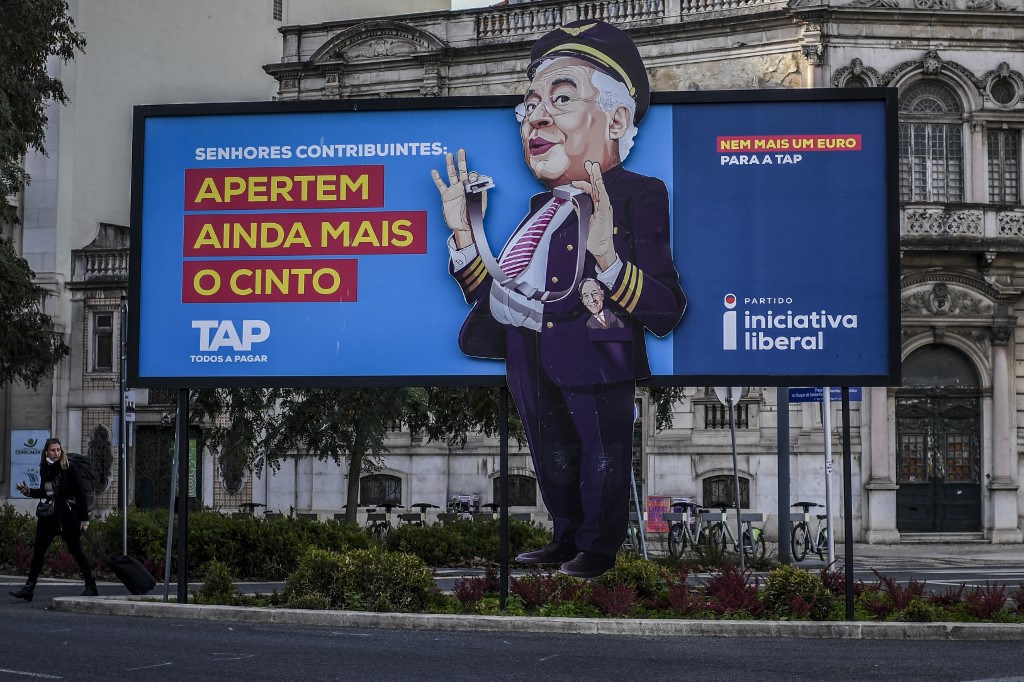 An Iniciativa Liberal party billboard caricaturing Portuguese Prime Minister Antonio Costa is seen at Saldanha in Lisbon on January 16, 2022. u00e2u20acu201d AFP pic