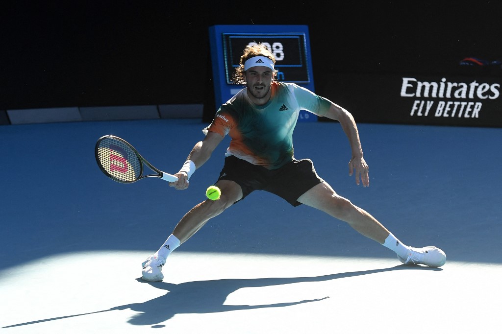 Greeceu00e2u20acu2122s Stefanos Tsitsipas hits a return against Franceu00e2u20acu2122s Benoit Paire during their menu00e2u20acu2122s singles match on day six of the Australian Open tennis tournament in Melbourne on January 22, 2022. u00e2u20acu201d AFP pic