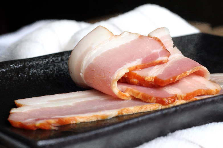 For meat lovers, some fried bacon and sausages give the omelette a breakfast feel.