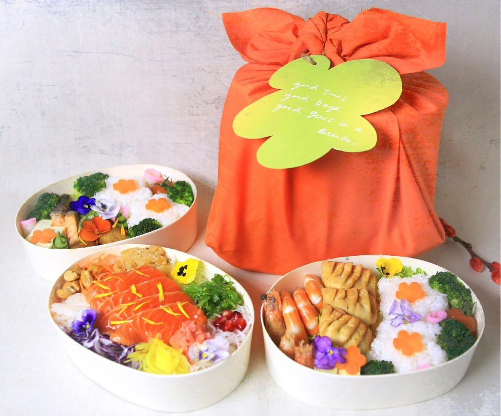Hinode Bento’s three CNY bentos are as a set wrapped in a 'furoshiki' style cloth. — Picture courtesy of Hinode Bento