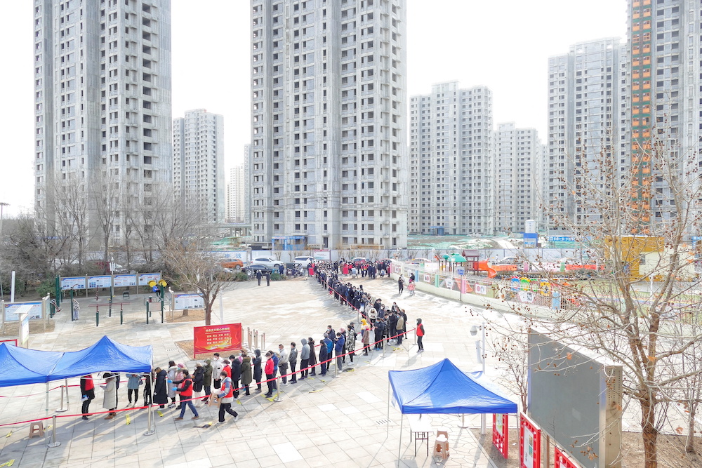 People line up for nucleic acid testing during a citywide mass testing for Covid-19 after local cases of the Omicron variant were detected in Tianjin, China January 9, 2022. u00e2u20acu201d  cnsphoto via Reuters
