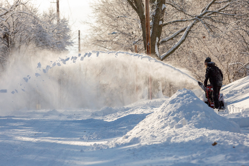 A Des Moines resident removes snow after Winter Storm Izzy in Des Moines, Iowa January 15, 2022. u00e2u20acu201d Reuters pic