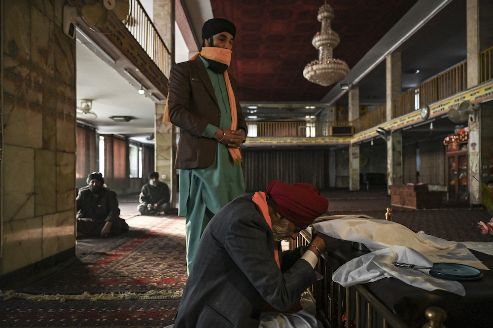 This picture taken on December 31, 2021 shows Afghan Sikh devotees praying at the Karte Parwan Gurdwara temple in Kabul. u00e2u20acu201d AFP pic