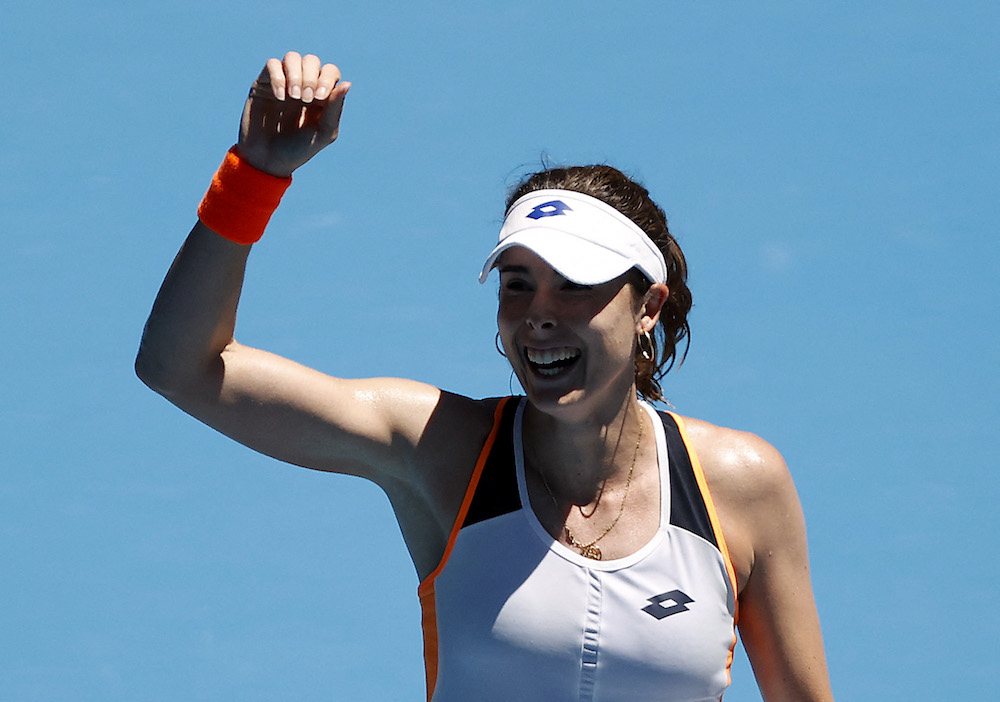 France's Alize Cornet celebrates winning her second round match against Spain's Garbine Muguruza, Melbourne January 20, 2022. u00e2u20acu201d Reuters pic 