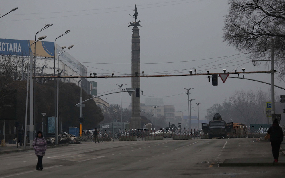 Kazakh law enforcement officers stand guard at the main square following mass protests triggered by fuel price increase in Almaty, Kazakhstan January 9, 2022. u00e2u20acu201d Reuters pic