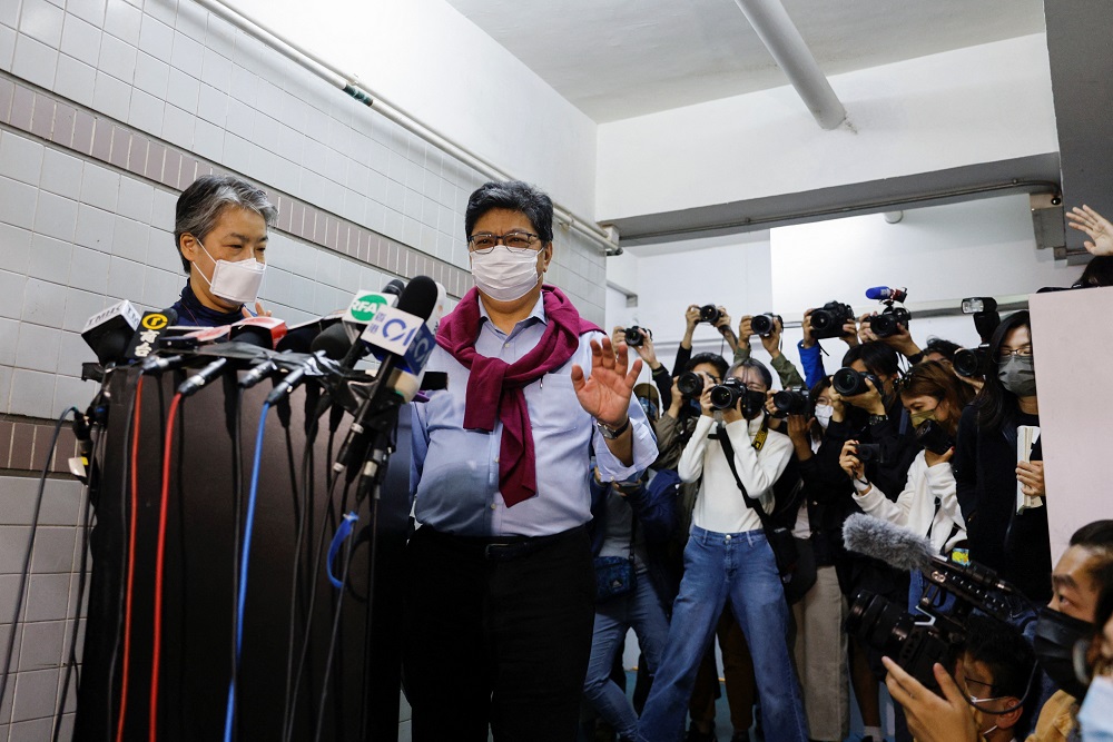 Chief writer at Citizen News Chris Yeung and Citizen News Chief Editor Daisy Li pose for photos after they announced Citizen News will cease operations in Hong Kong January 3, 2022. u00e2u20acu201d Reuters pic