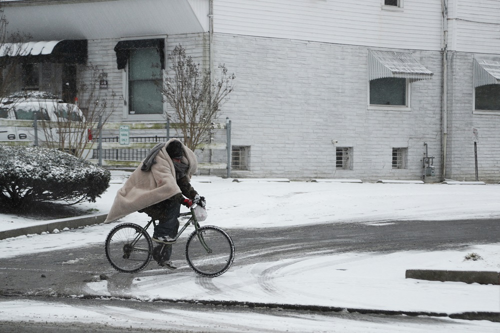 A man bikes during a snow storm in Louisville, Kentucky January 6, 2022. u00e2u20acu201d Reuters pic
