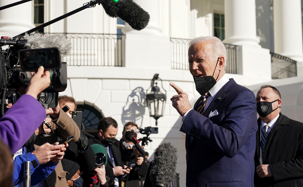 US President Joe Biden speaks to reporters as he departs the White House to travel to Georgia, in Washington January 11, 2022. u00e2u20acu201d Reuters pic