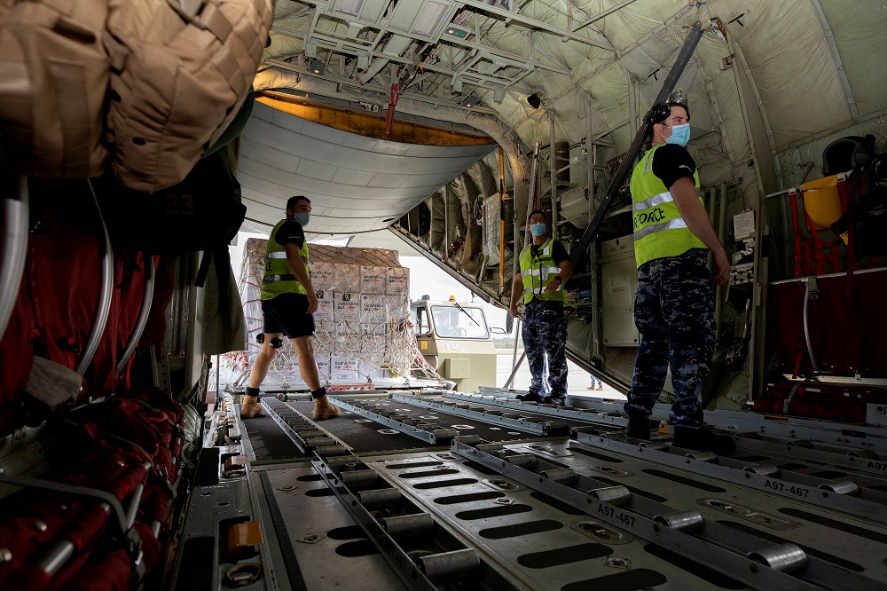 Australian Air Force Air Movement Operators load humanitarian assistance and supplies on board an aircraft bound for Tonga to assist in relief efforts, at RAAF Base Amberley, Queensland January 21, 2022. u00e2u20acu201d Picture by Australian Department of Defence/Han