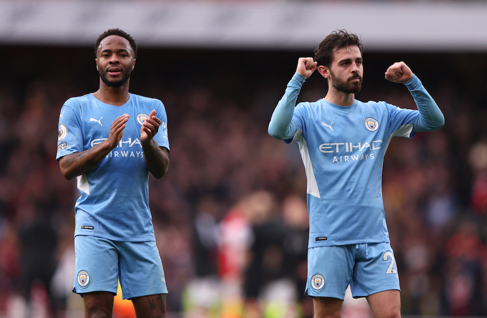 Manchester City's Raheem Sterling and Bernardo Silva celebrate after the match Arsenal v Manchester City u00e2u20acu201c match at Emirates Stadium, London, Britain January 1, 2022. u00e2u20acu201d Reuters pic