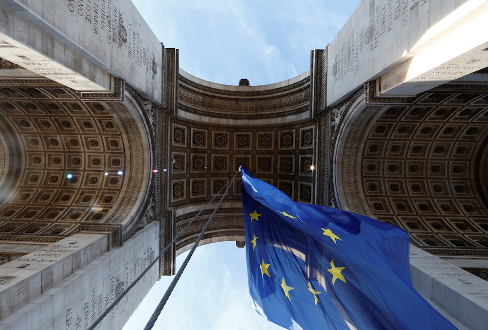 The European flag flies under the Arc de Triomphe to celebrate the start of the French presidency of the European Union, in Paris, France, January 1, 2022. u00e2u20acu201d Reuters pic