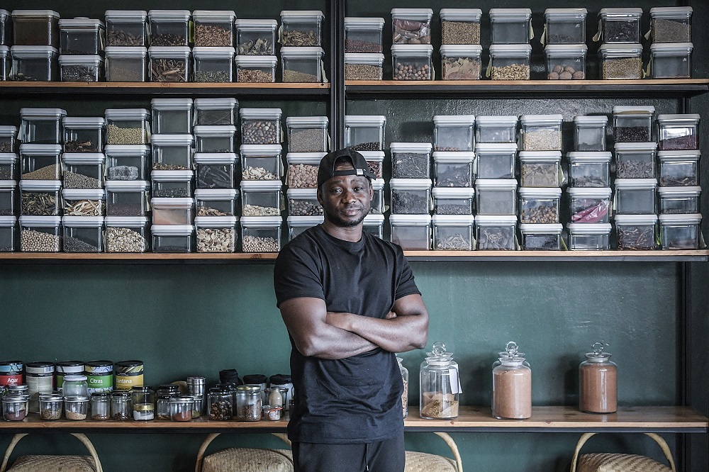 30-year-old Congolese chef Dieuveil Malonga poses inside his restaurant u00e2u20acu02dcMeza Malongau00e2u20acu2122 in Rwandau00e2u20acu2122s capital Kigali. u00e2u20acu201d AFP pic