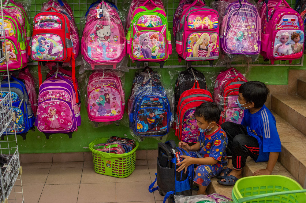 People are shopping in preparation for the school session which will open next Monday in Kuala Lumpur January 9, 2022. u00e2u20acu201d Picture by Shafwan Zaidon