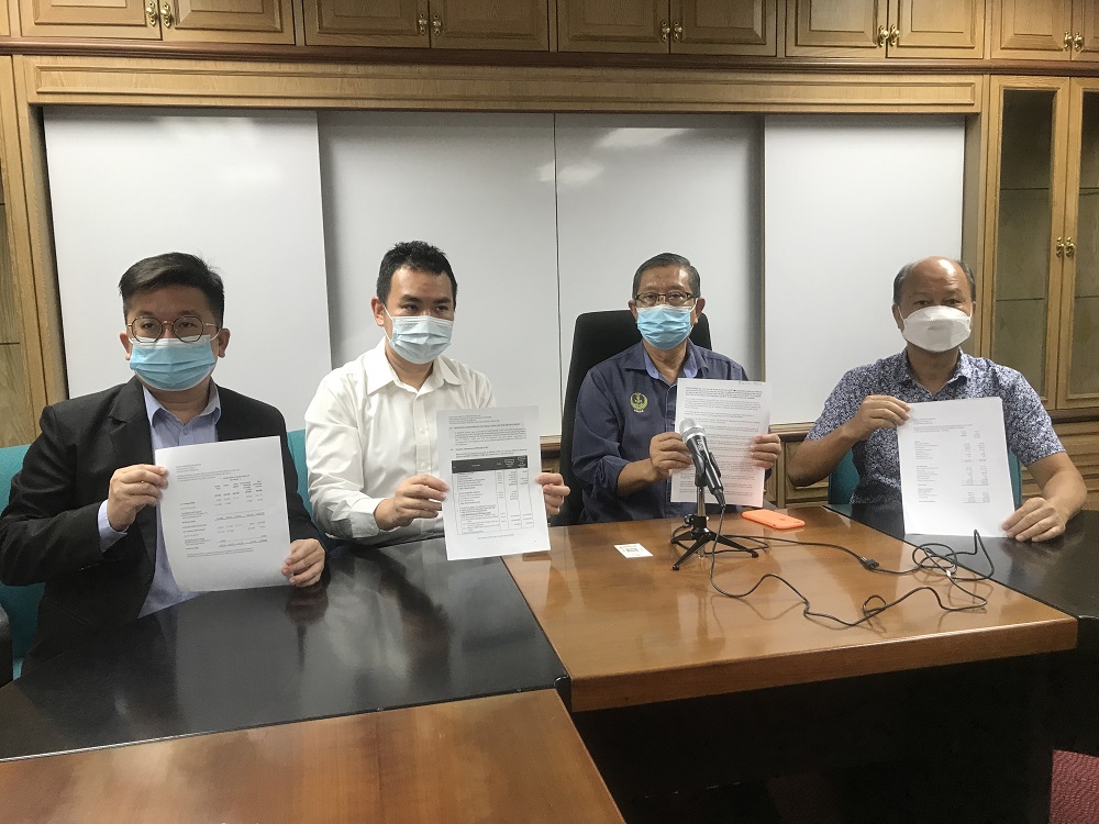 (From left) Menglembu assemblyman Steven Chaw, Keranji assemblyman Chong Zhemin, Sungai Rapat assemblyman Datuk Seri Mohammad Nizar Jamaluddin and Jelapang assemblyman Cheah Poh Hian showing the documents related to the financial positions of PCBD at the 