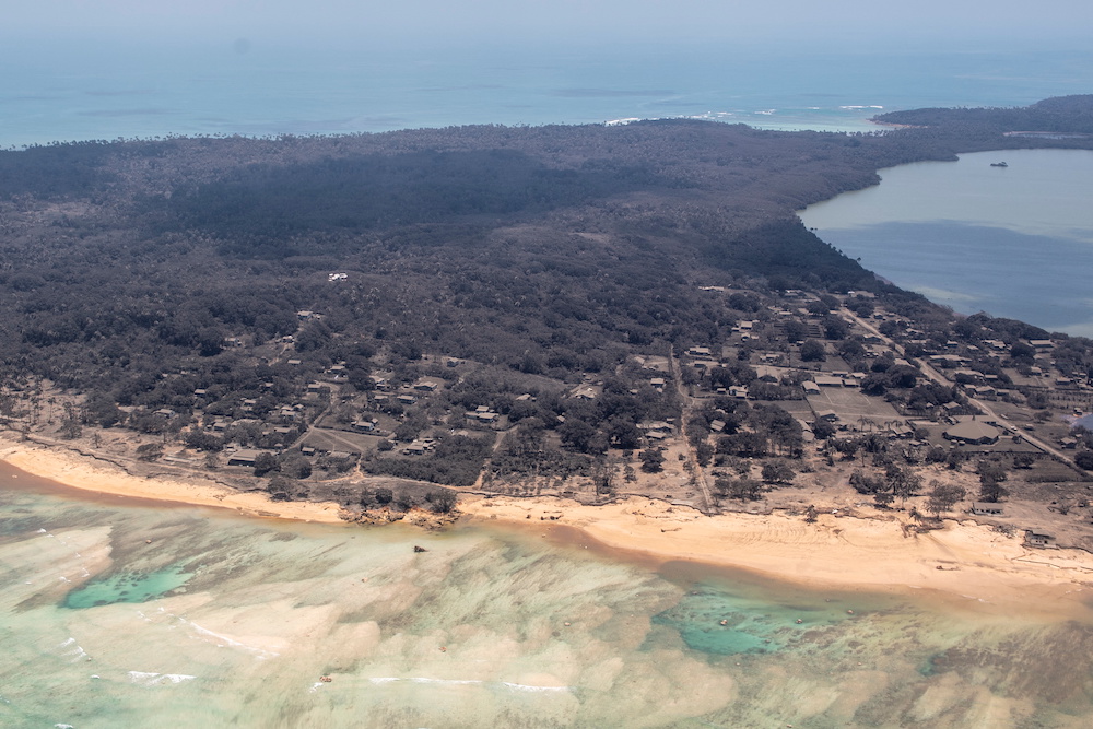 A general view from a New Zealand Defence Force P-3K2 Orion surveillance flight shows heavy ash fall over Nomuka in Tonga  January 17, 2022. u00e2u20acu201d Reuters picnn