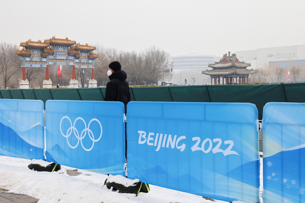 A security guard stands near the closed loop u00e2u20acu02dcbubbleu00e2u20acu2122 at the Main Press Centre ahead of the Beijing 2022 Winter Olympics in Beijing, China January 23, 2022. u00e2u20acu201d Reuters picnn