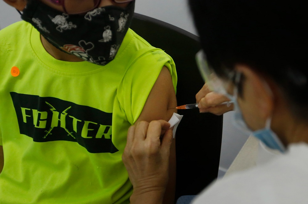 With this change, parents or guardians who now have to first register for the vaccine for their children will no longer have to wait up to five working days to receive a unique booking link via SMS to book an appointment for the jab. u00e2u20acu201d TODAY pic